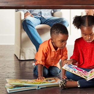 Kids with book | Cleveland Carpets and Floors